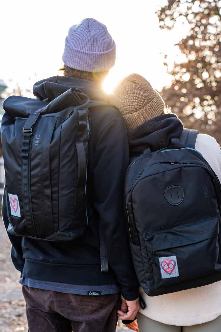 Rucksack Pärchen mit Sonnenuntergang 